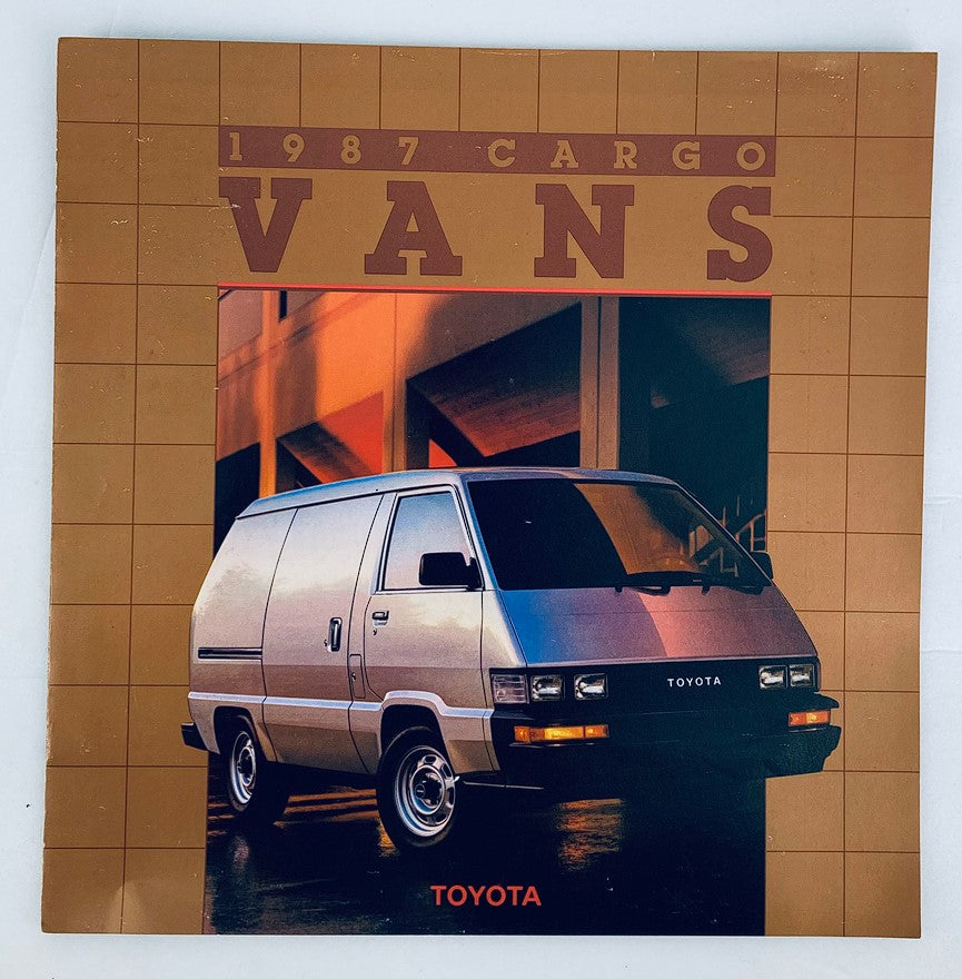 Cover of the 1987 Toyota Cargo Vans Dealer Showroom Sales Brochure Guide Catalog featuring a silver Toyota cargo van on a stylish background.
