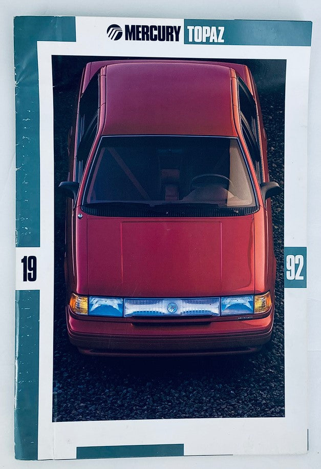 1992 Mercury Topaz Dealer Showroom Sales Brochure Guide Catalog featuring an overhead view of a red Mercury Topaz, showcasing the car's design and marketing details.