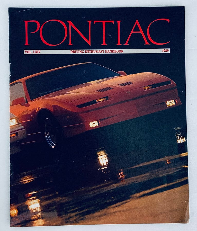 1989 Vol 64 Pontiac Handbook Dealer Showroom Sales Brochure Guide Catalog featuring a classic Pontiac car, showcasing its sleek design and vibrant colors, ideal for automotive enthusiasts.
