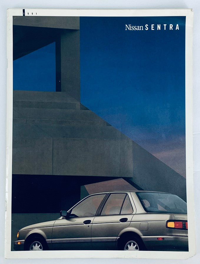 1991 Nissan Sentra Dealer Showroom Sales Brochure featuring a silver Nissan Sentra parked against a modern architectural backdrop.