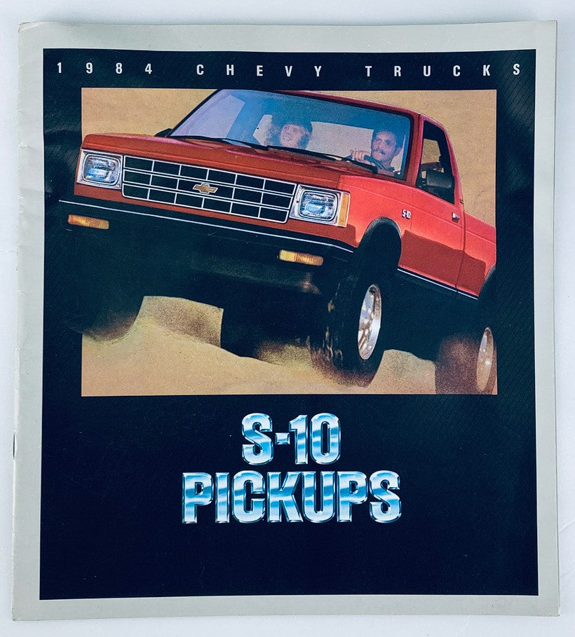 1984 Chevrolet S-10 Pickup Trucks Dealer Showroom Sales Brochure Guide Catalog featuring a red Chevrolet S-10 pickup truck in action.