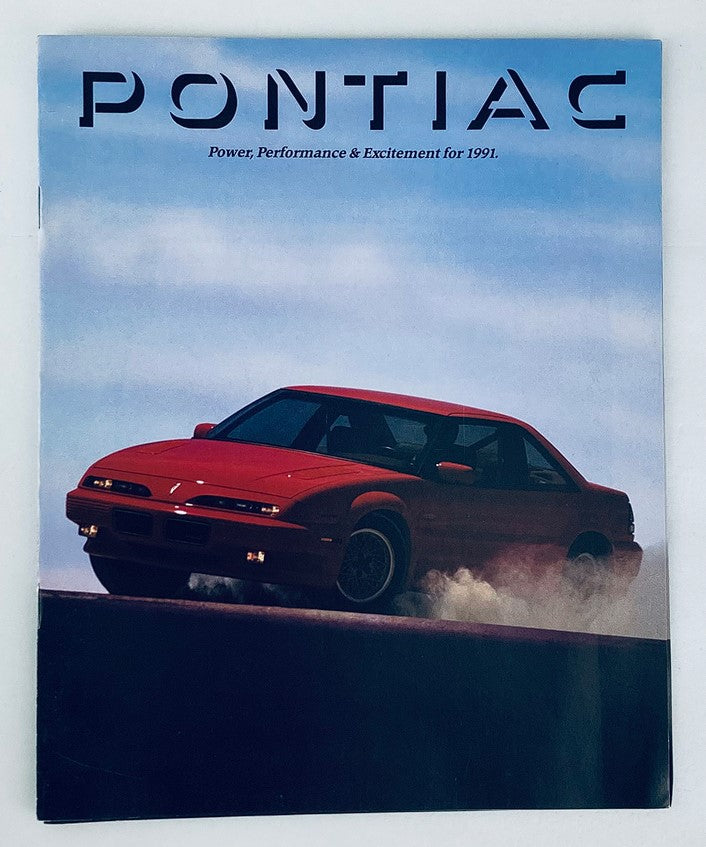 1991 Pontiac Lineup Dealer Showroom Sales Brochure featuring a red Pontiac car with the title 'Power, Performance & Excitement for 1991' on the cover.