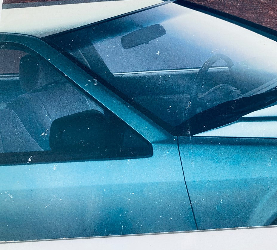 Close-up of the 1988 Honda Accord Coupe Dealer Showroom Sales Brochure highlighting the vehicle's interior details and stylish features.