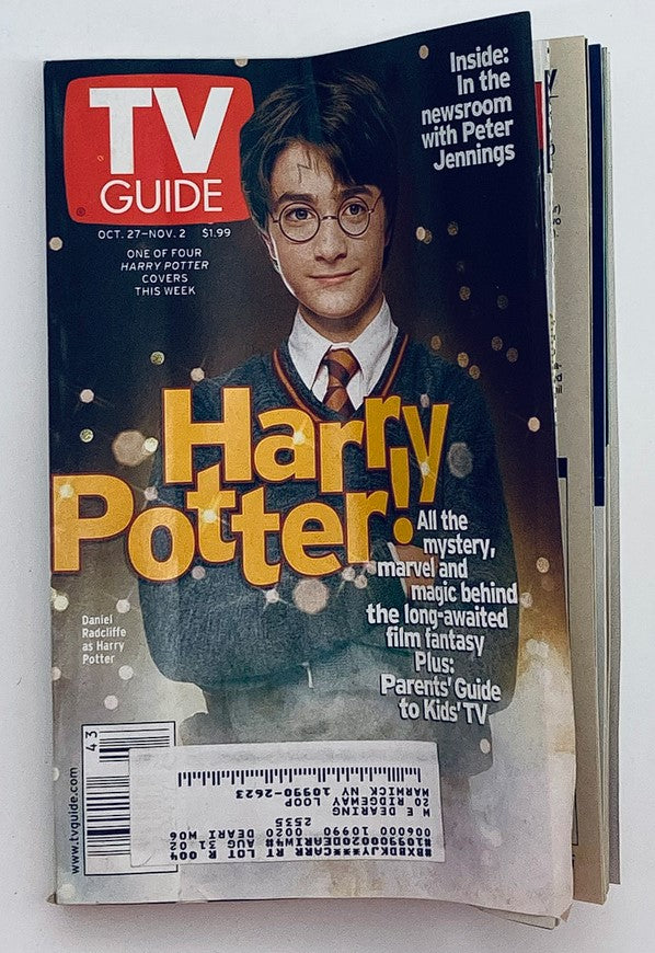 TV Guide Magazine October 27 2001 featuring Daniel Radcliffe as Harry Potter on the cover. The magazine encapsulates early 2000s pop culture and features insights into fantasy films.