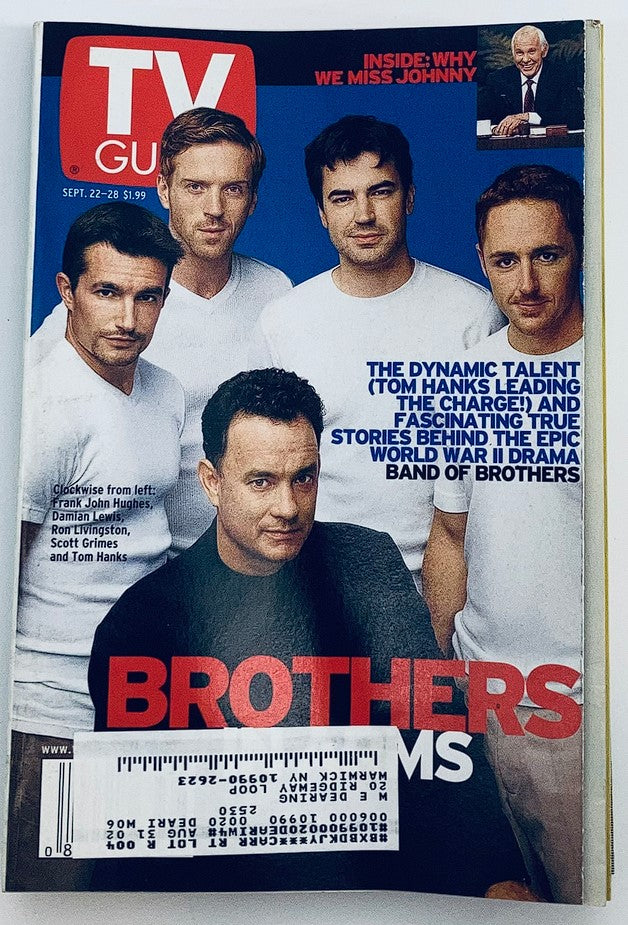 TV Guide Magazine cover from September 22, 2001, featuring Tom Hanks and four actors from the series 'Band of Brothers.' This edition highlights Tom Hanks's role and includes insights on the show, alongside a tribute to Johnny Carson.