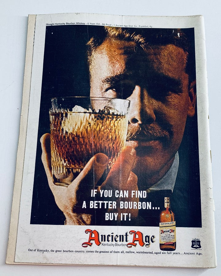 Advertisement page in VTG Playboy Magazine April 1962 promoting Ancient Age Bourbon with an image of a man holding a glass of whiskey.