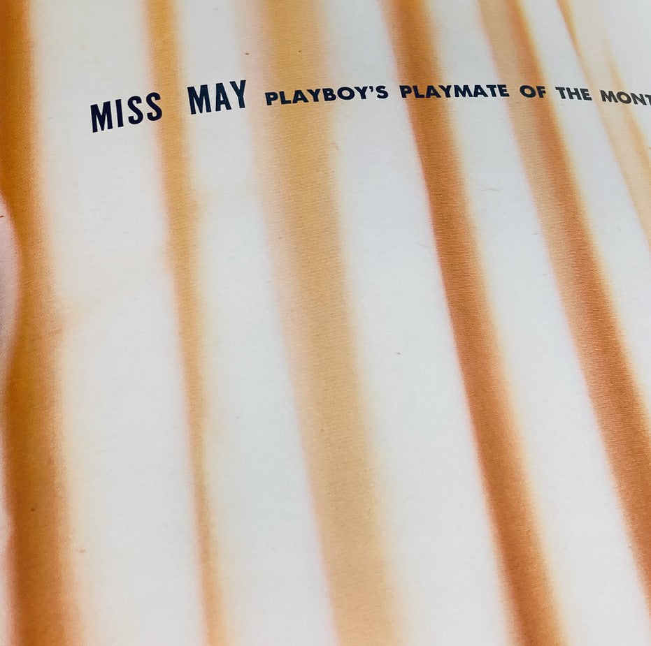 Title page from the vintage Playboy Magazine May 1960, announcing Miss May as Playboy's Playmate of the Month.