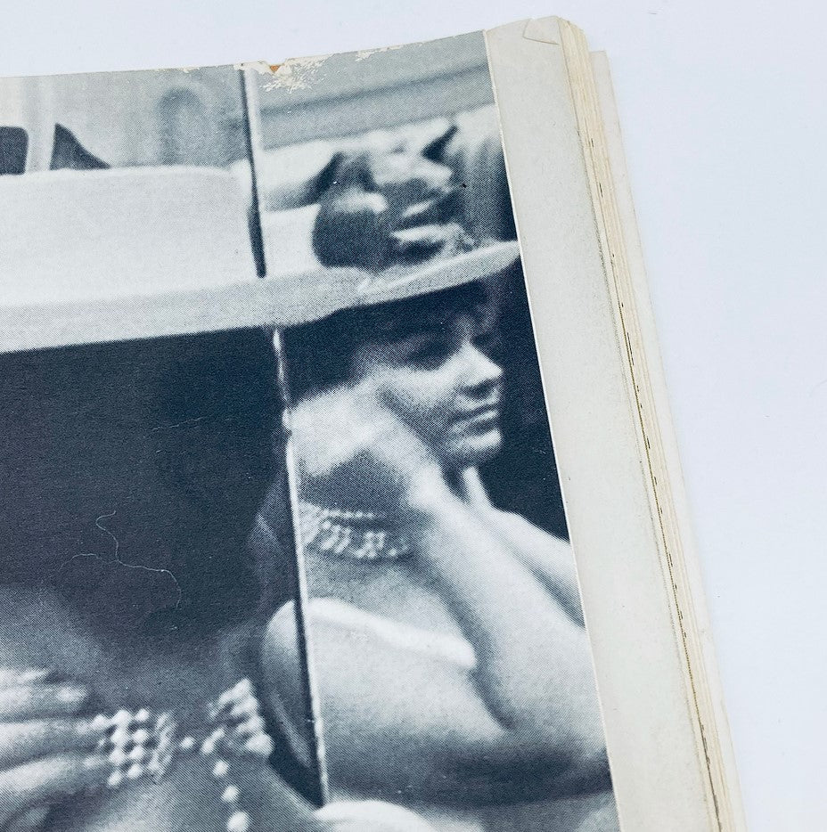 Another angle of Delores Wells in a candid pose while adjusting her hair, from the June 1960 Playboy Magazine.