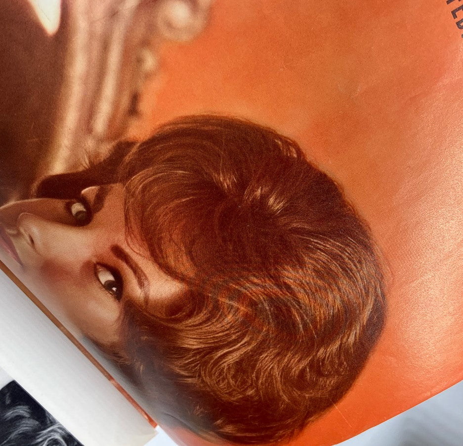 Vintage Playboy Magazine February 1963 interior image showing a captivating close-up of Toni Ann Thomas's hair.
