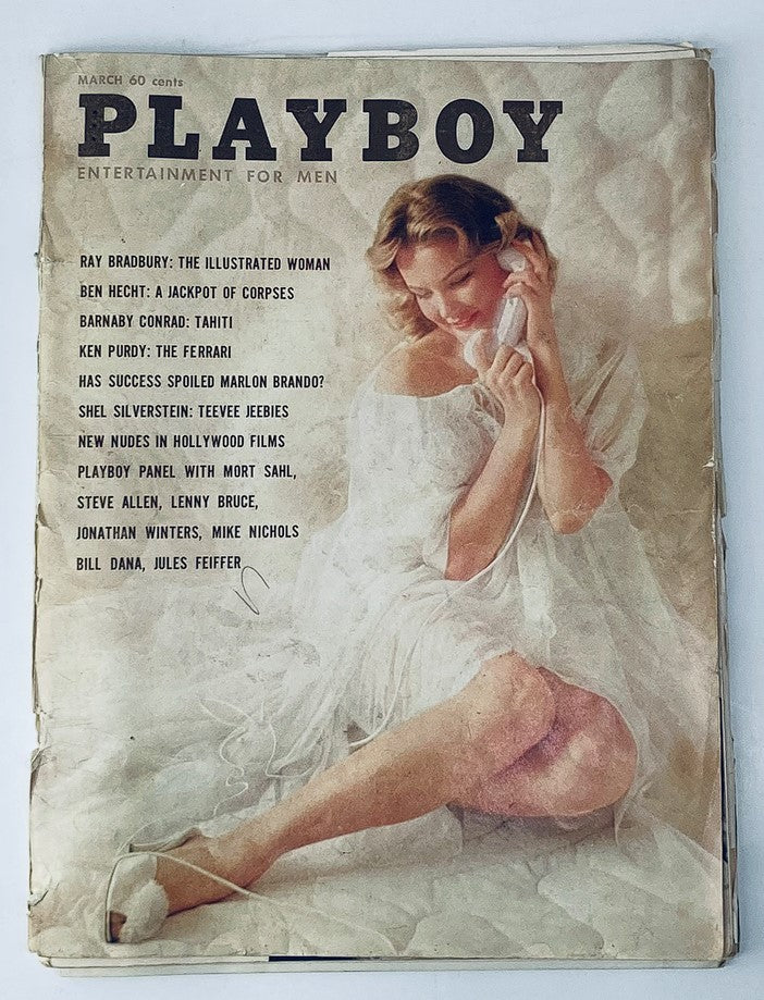 Cover of VTG Playboy Magazine March 1961 featuring a woman in an elegant outfit holding a phone, with text highlighting featured articles.