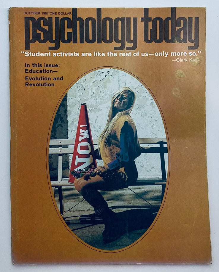 Cover of VTG Psychology Today Magazine from October 1967, featuring the theme 'Education, Evolution and Revolution.' The cover showcases a person seated with a 'STOP' sign, representing the sociocultural movements of the 1960s.