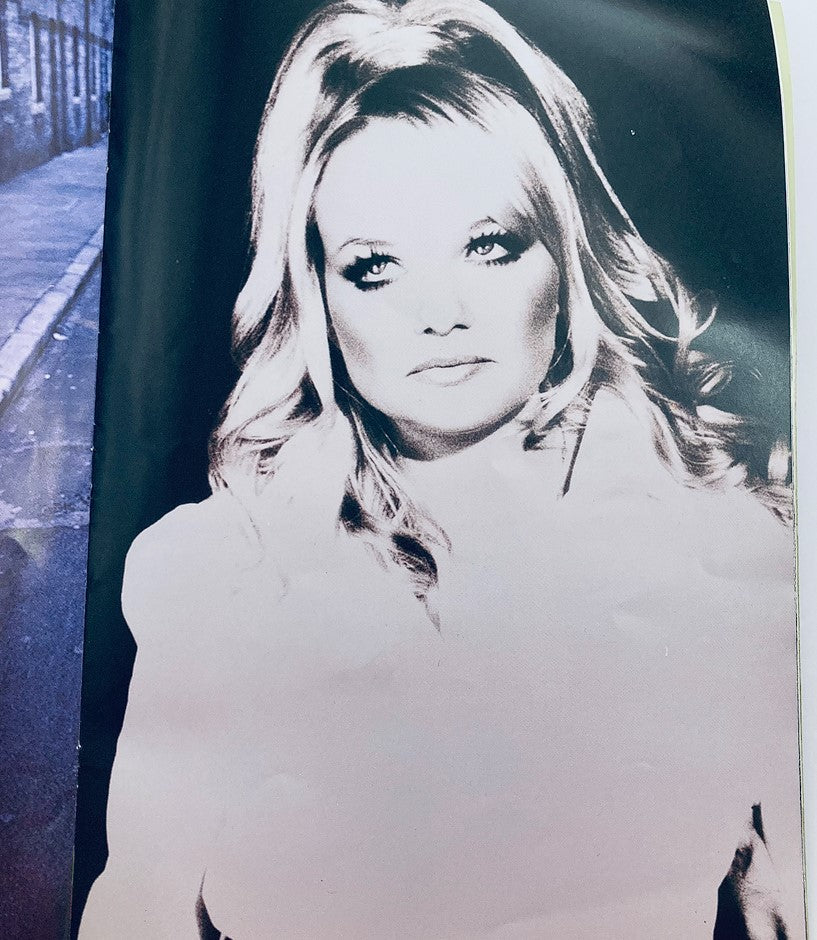 1998 Spice Girls - Spice World The Tour Program portrait of one member with long blonde hair and glamorous makeup, captured in a striking black and white style.