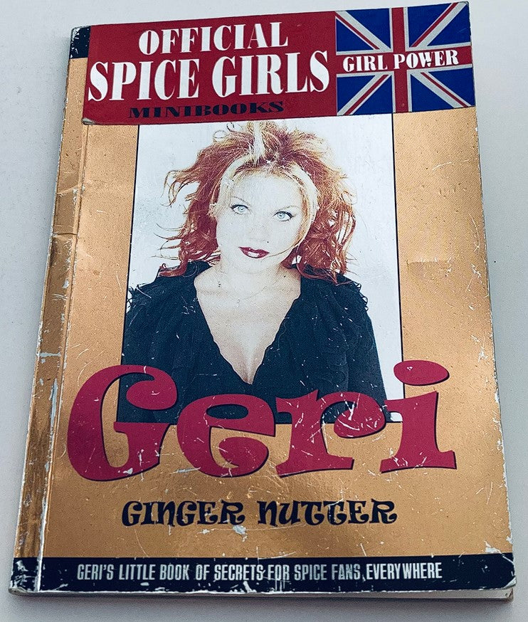 1997 Official Spice Girls Minibook featuring Geri Ginger Nutter, showcasing the unique cover design and vibrant imagery that highlights the Girl Power theme.