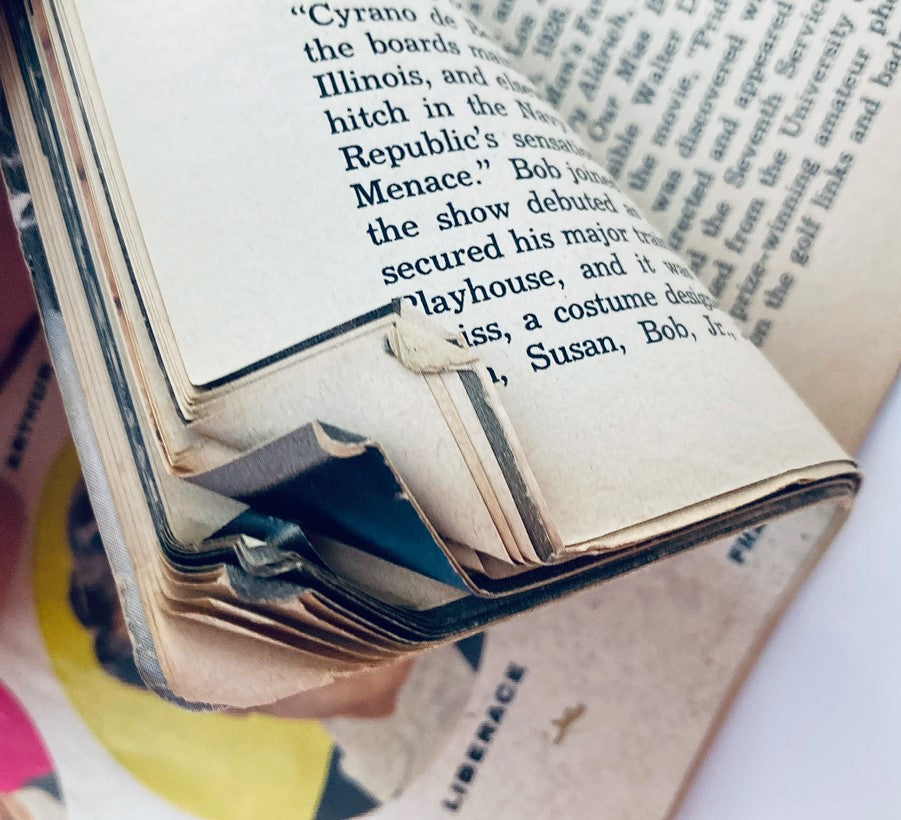 Interior page of the VTG TV Radio Annual Magazine 1955 showing worn edges and vintage content related to television history.