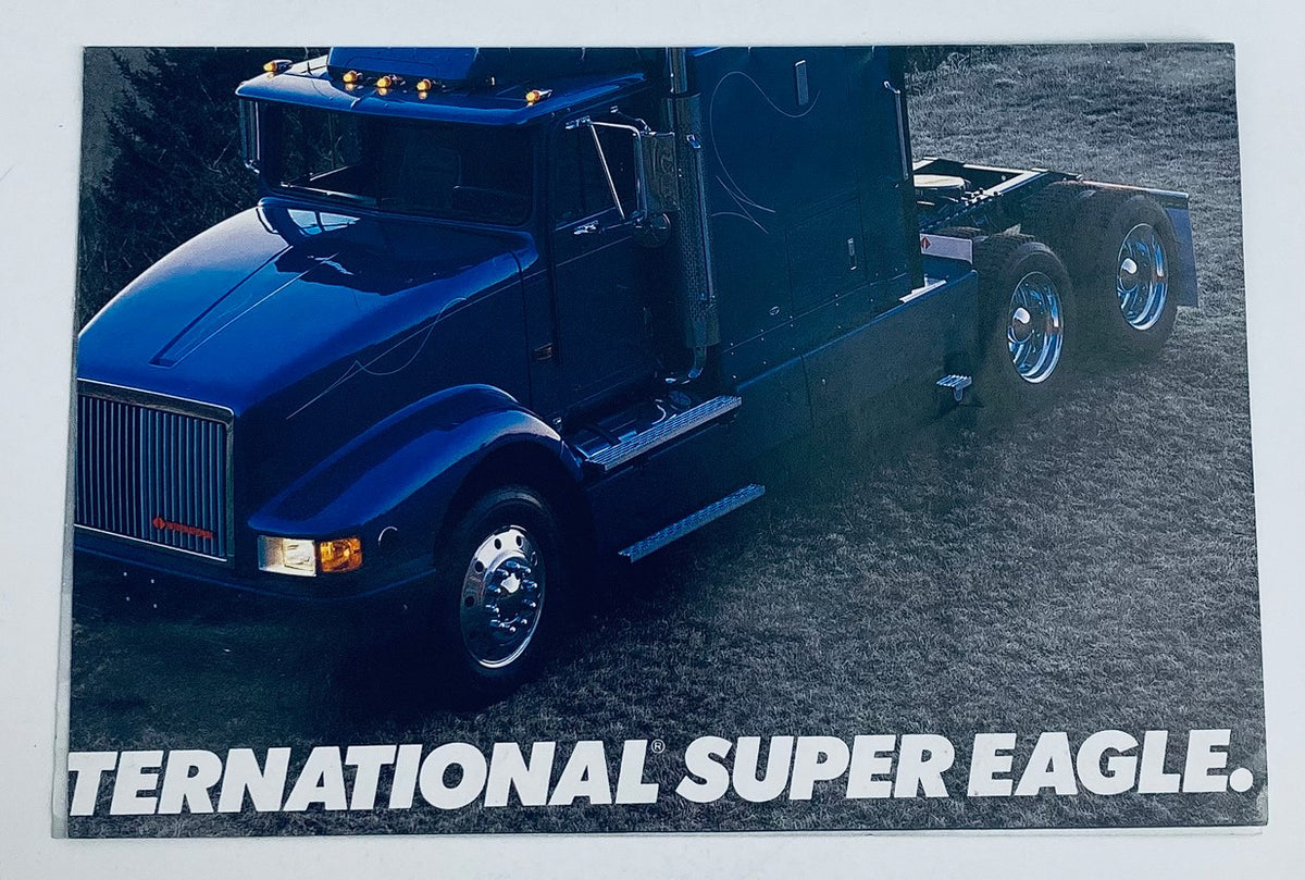 1991 International Super Eagle Truck Dealer Showroom Sales Brochure Catalog featuring a striking blue International Super Eagle truck, showcasing its sleek design and chrome wheels, ideal for collectors and enthusiasts of vintage automotive literature.