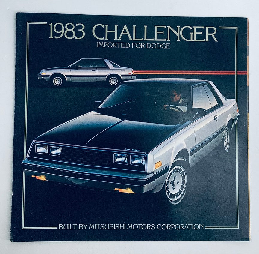 1983 Dodge Challenger Dealer Showroom Sales Brochure Cover featuring a sleek gray 1983 Dodge Challenger model car, highlighting the vehicle's design and 'Imported for Dodge' tagline. This brochure showcases the collaboration with Mitsubishi Motors Corporation.