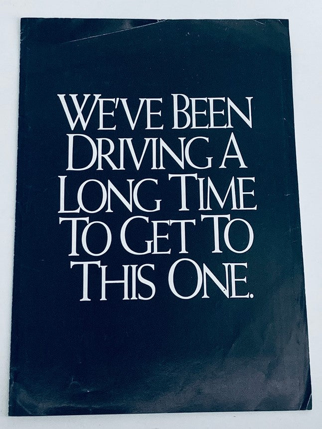 1991 NASCAR Michael Waltrip Pennzoil Car Print Ad featuring a striking black cover with the bold text 'We've Been Driving A Long Time To Get To This One.' showcasing vintage advertising style.
