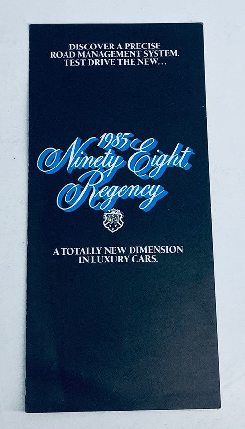 Front cover of the 1985 Oldsmobile Ninety Eight Regency Dealer Showroom Sale Brochure, featuring the title and a design emphasizing luxury.
