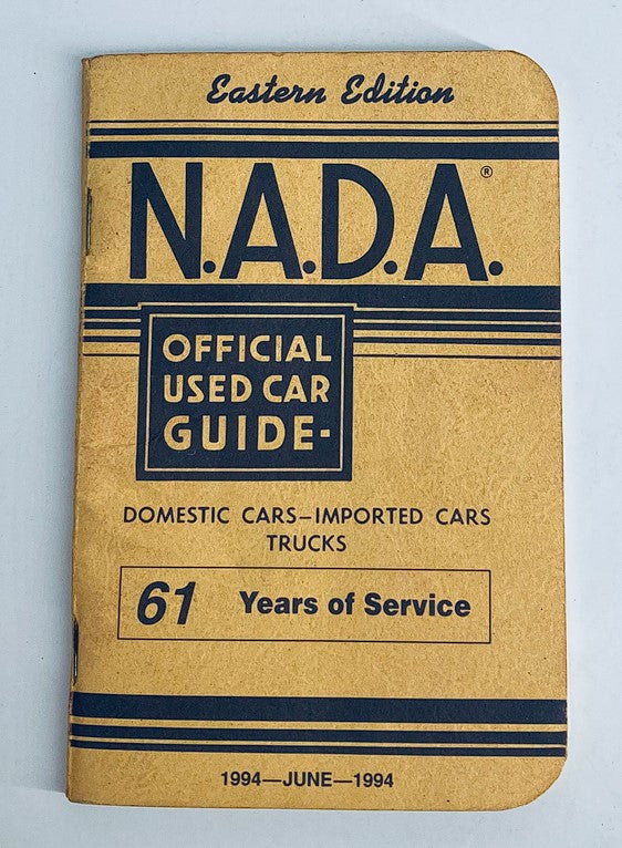 1994 NADA Eastern Edition Official Used Car Brochure Guide Catalog cover featuring a classic design, emphasizing domestic and imported cars, marked with '61 Years of Service'.