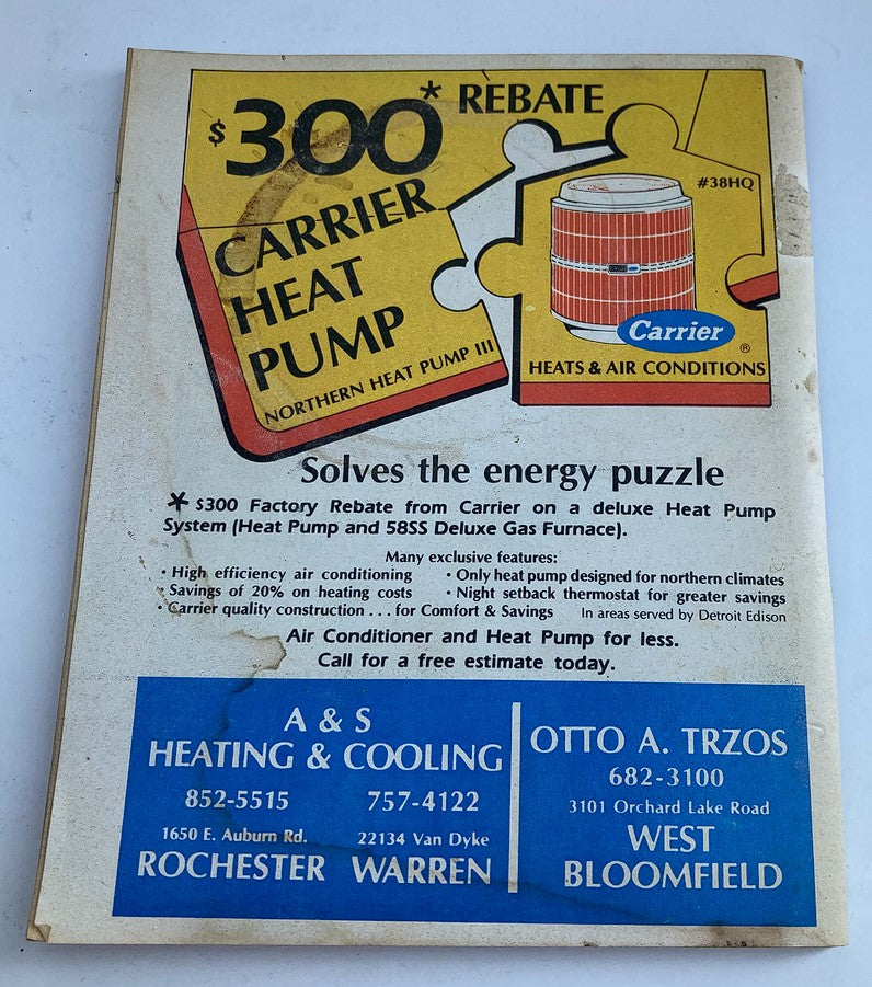 Advertisement for Carrier Heat Pump offering a $300 rebate, focusing on energy savings with high efficiency air conditioning systems, featured in the August 1, 1982 issue of Detroit News Magazine.