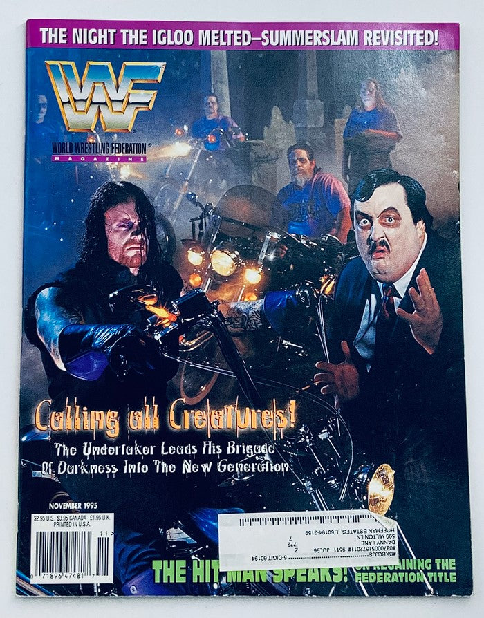 WWF World Wrestling Federation Magazine November 1995 cover featuring The Undertaker and Paul Bearer. The cover highlights The Undertaker leading his Brigade of Darkness.