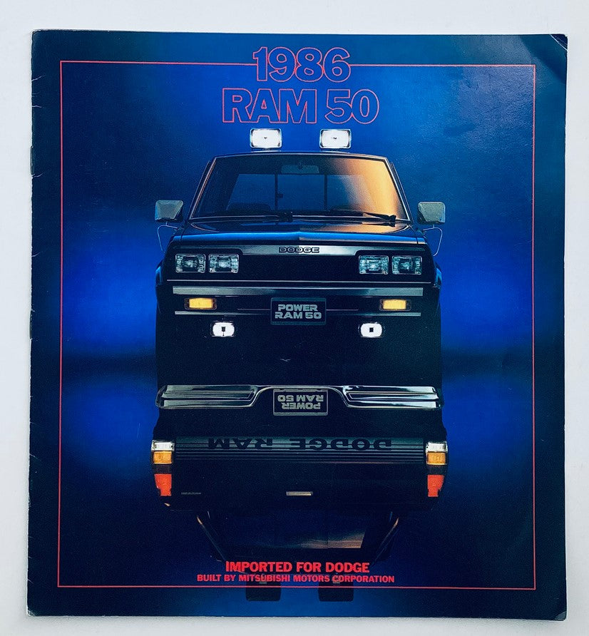 1986 Dodge Ram 50 Dealer Showroom Sales Brochure cover featuring the truck in a stylish blue background.