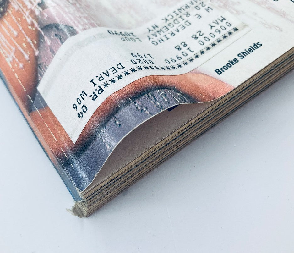 Side view of TV Guide Magazine September 19, 1987, displaying the pages and the worn condition characteristic of vintage magazines.