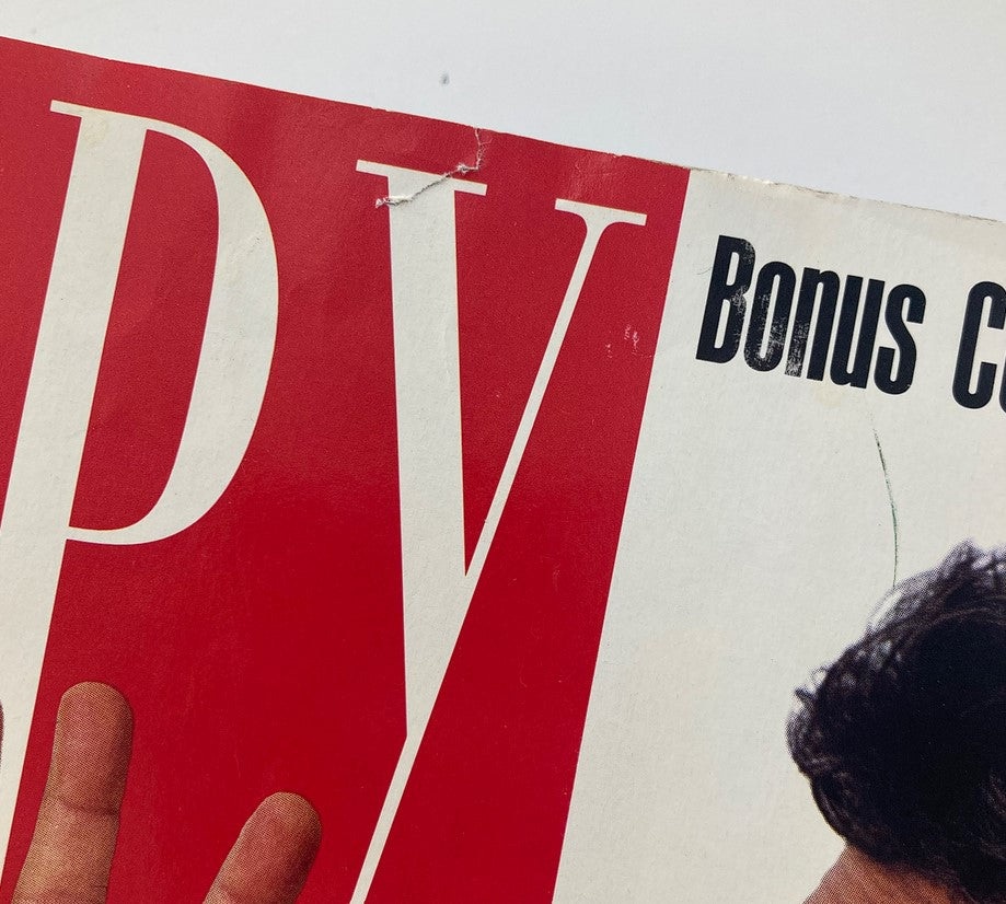 Top section of Spy Magazine October 1991 cover showing details of the magazine title and bonus comic.