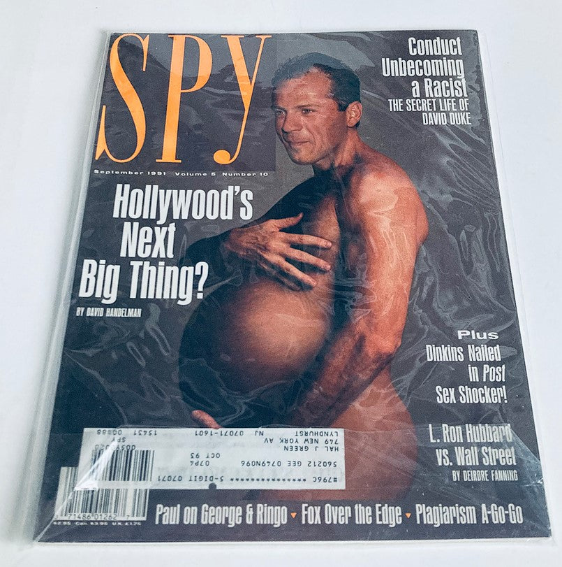 Spy Magazine September 1991 cover in plastic protective covering, highlighting Bruce Willis as Hollywood's next big thing with surrounding text and details of the issue.