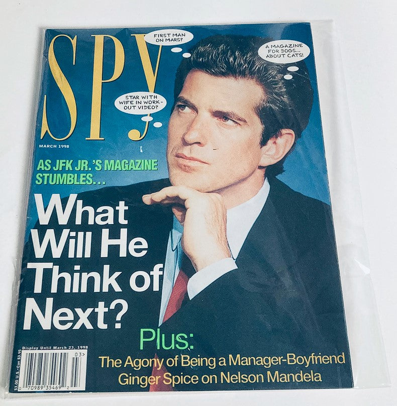 Cover of Spy Magazine March 1998 showcasing John F. Kennedy Jr. with the headline 'What Will He Think of Next?', capturing the essence of celebrity culture in the late 90s.