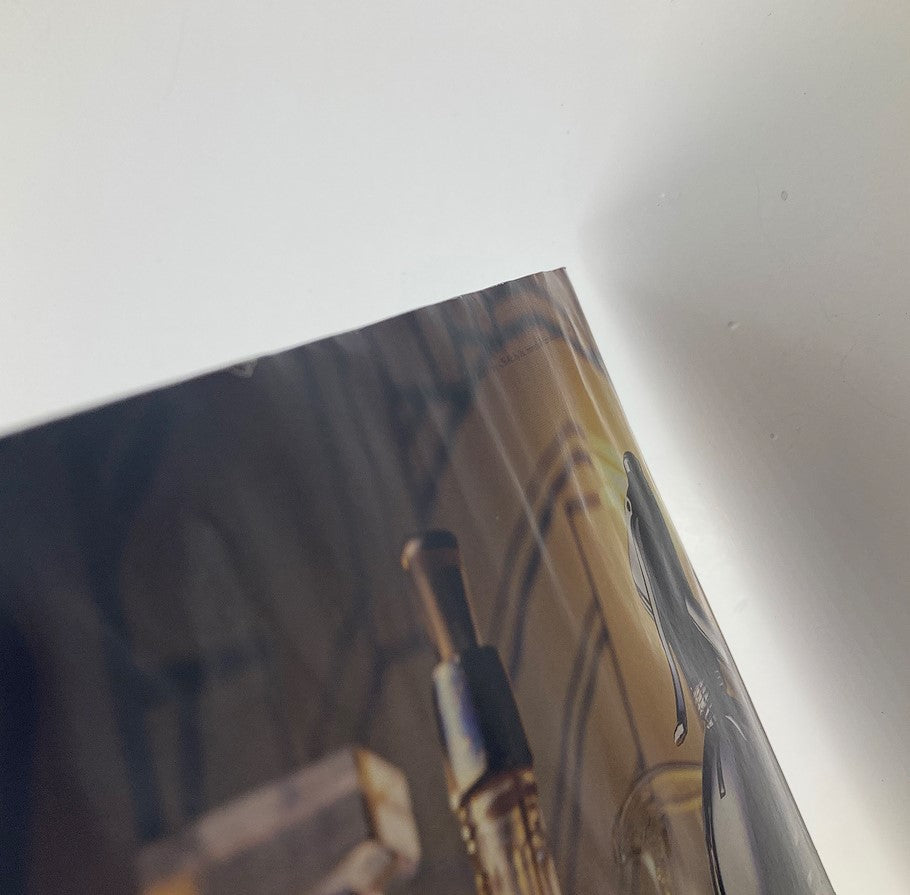 Close-up of a luxurious beauty product advertisement within Spy Magazine November 1989, showcasing an upscale aesthetic.