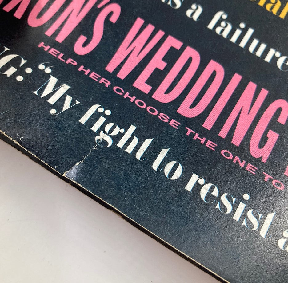 Close-up of the VTG Photoplay Magazine April 1970 Vol 77 #4 detailing headlines such as 'Tricia Nixon's Wedding Dress' and 'My fight to resist alcohol.' A collectible piece showcasing 1970s pop culture.