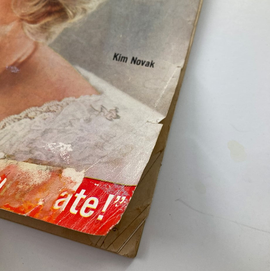 Side view of the VTG Modern Screen Magazine March 1957 showing Kim Novak's name and magazine wear, emphasizing its vintage authenticity.