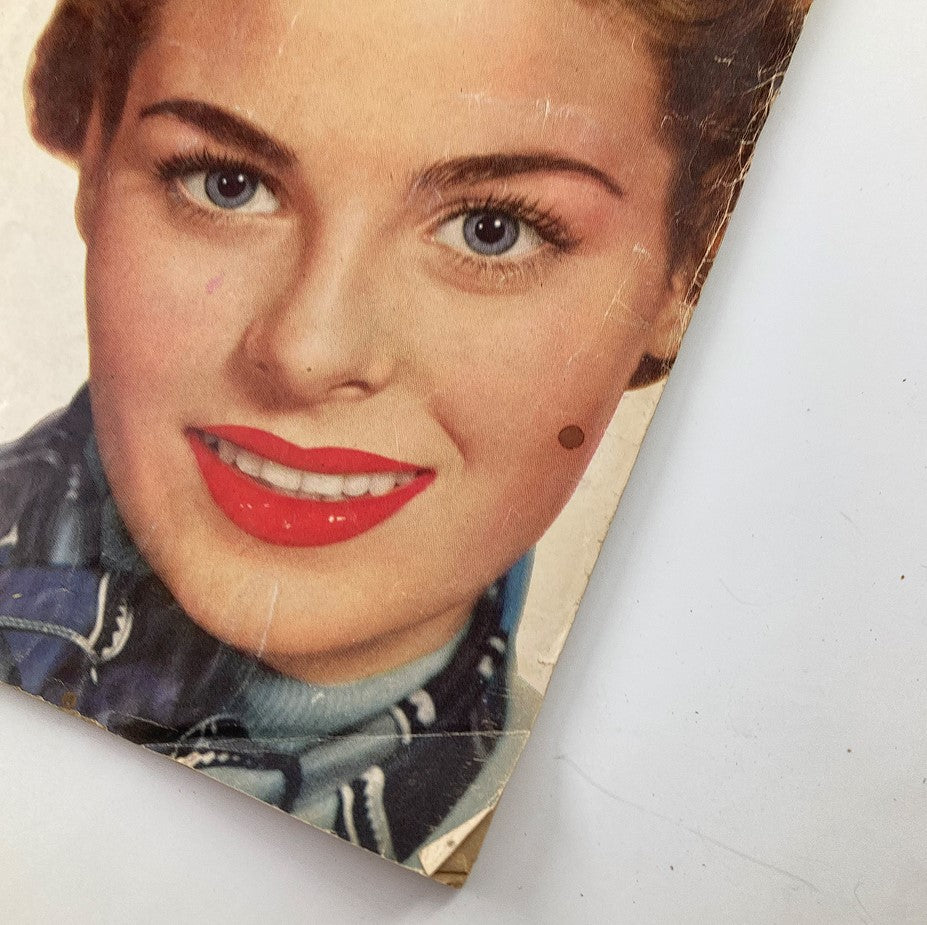 Close-up view of the cover of VTG True Experience Magazine April 1954 Vol 54 #5 showcasing the model's face and vibrant red lipstick.