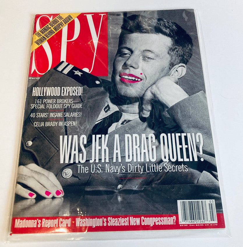 Spy Magazine March 1993 in protective cover, displaying John F. Kennedy on the cover with vibrant text 'Was JFK a Drag Queen? The U.S. Navy's Dirty Little Secrets'.