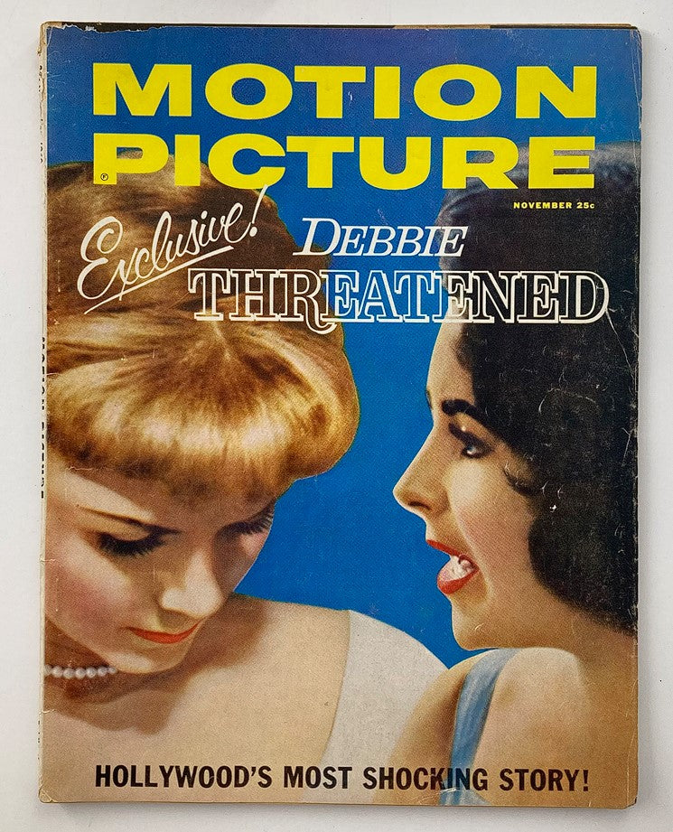 VTG Motion Picture Magazine November 1960 cover showcasing iconic stars Debbie Reynolds and Liz Taylor with the headline 'Exclusive! Debbie Threatened' and vibrant colors.