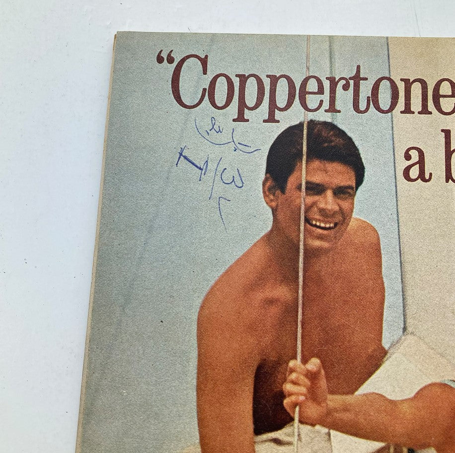 Back cover of VTG Motion Picture Magazine July 1965 with handwritten notes, providing a nostalgic glimpse into vintage magazine collecting.
