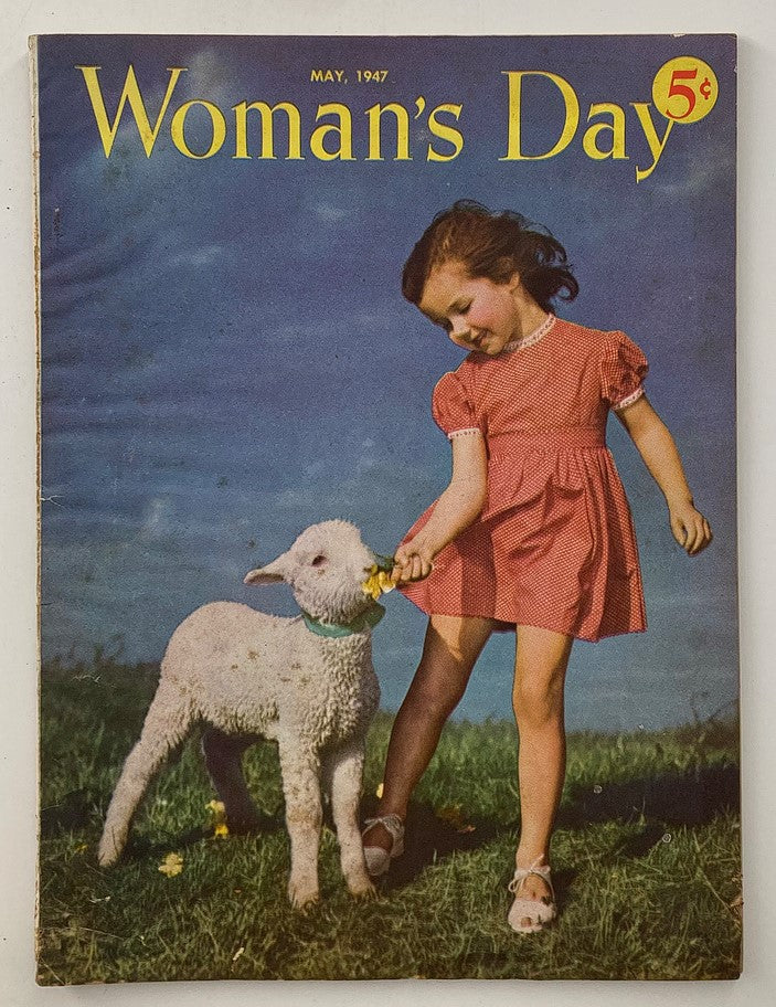 Cover of the VTG Woman's Day Magazine May 1947 featuring a girl in a red dress holding flowers next to a lamb, symbolizing childhood and nature.