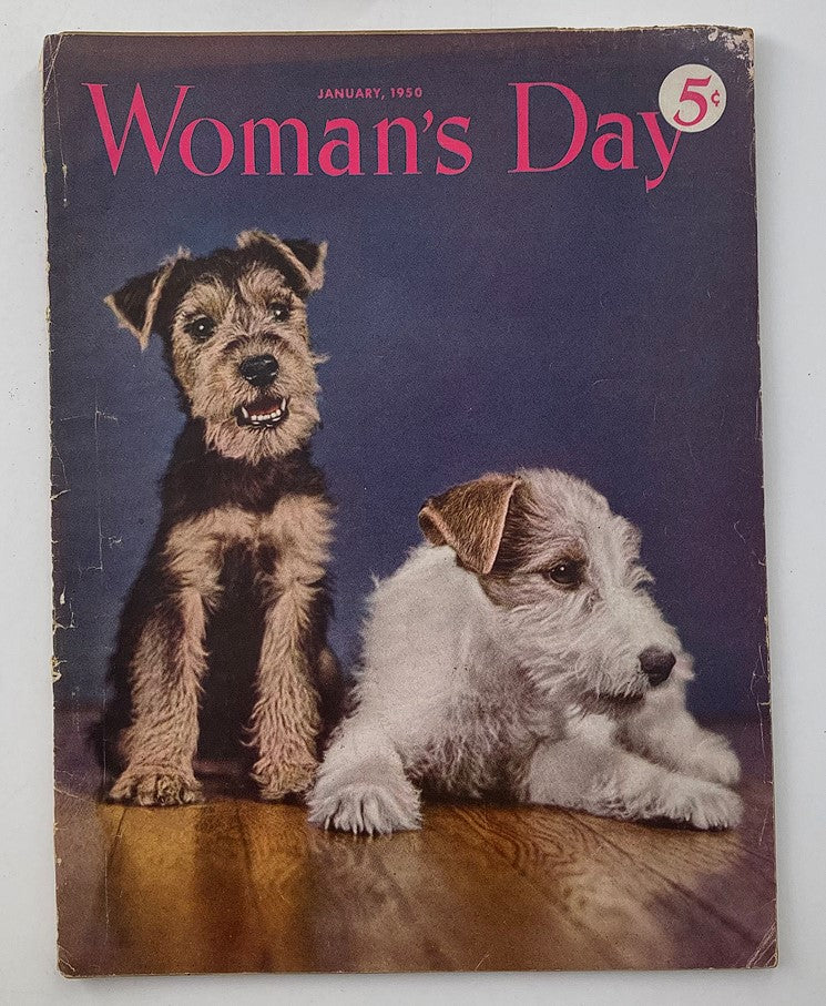 Cover of VTG Woman's Day Magazine January 1950 featuring two adorable puppies on a wooden floor, capturing the charm of vintage publications.