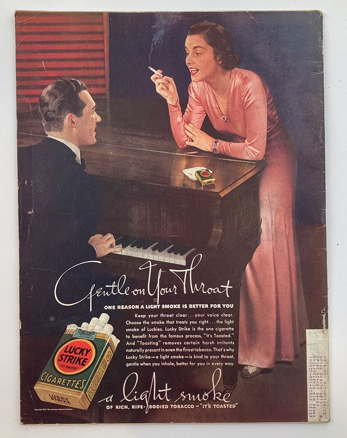 Vintage advertisement for Lucky Strike cigarettes in the VTG Life Magazine February 8, 1937, showcasing a woman at a piano and promoting a smooth smoking experience.