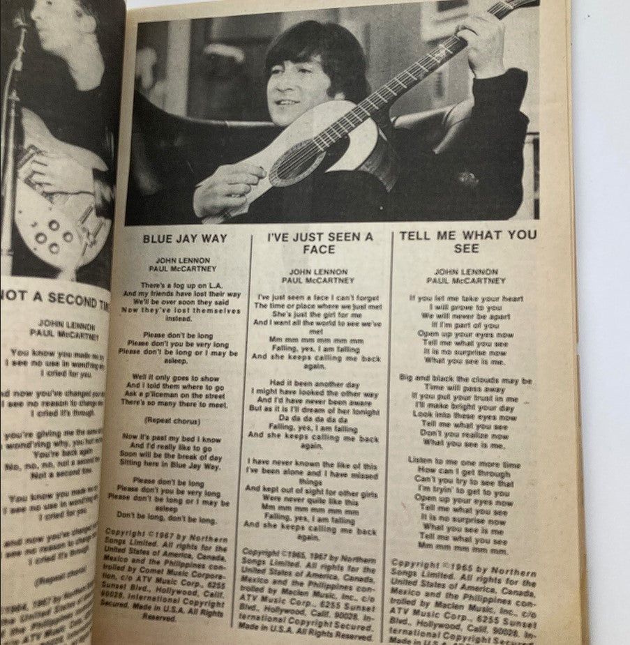 Inside page of '1981 Song Hits' Tribute to John Lennon, displaying lyrics for 'Blue Jay Way' along with a photo of John Lennon playing guitar.