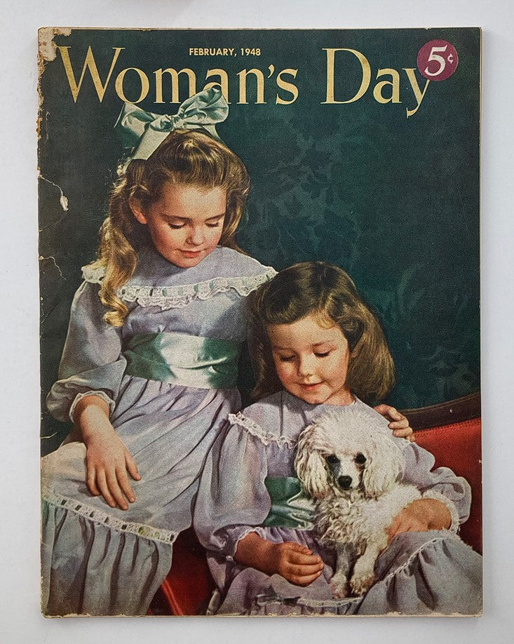 Cover of VTG Woman's Day Magazine February 1948, featuring two girls in vintage dresses with a small dog, highlighting the nostalgic theme of the issue.
