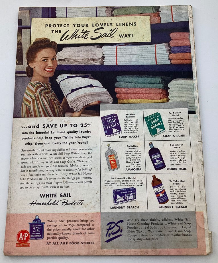 January 1942 Woman's Day Magazine ad featuring White Sail household products with a smiling woman showcasing laundry items and towels.