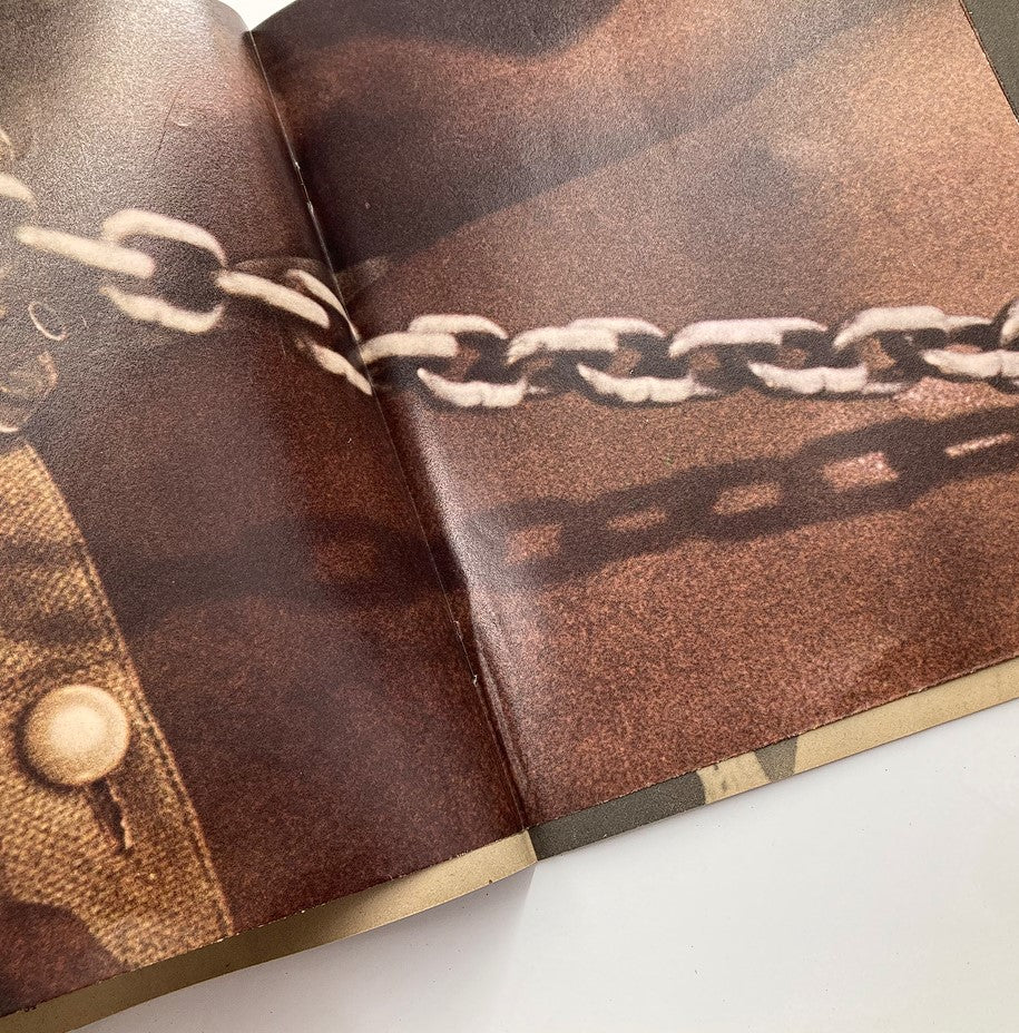 Double page spread in the VTG TV Favorites Spectacular Magazine 1977 showcasing a detailed close-up image of a chain symbolizing the themes explored in the magazine.
