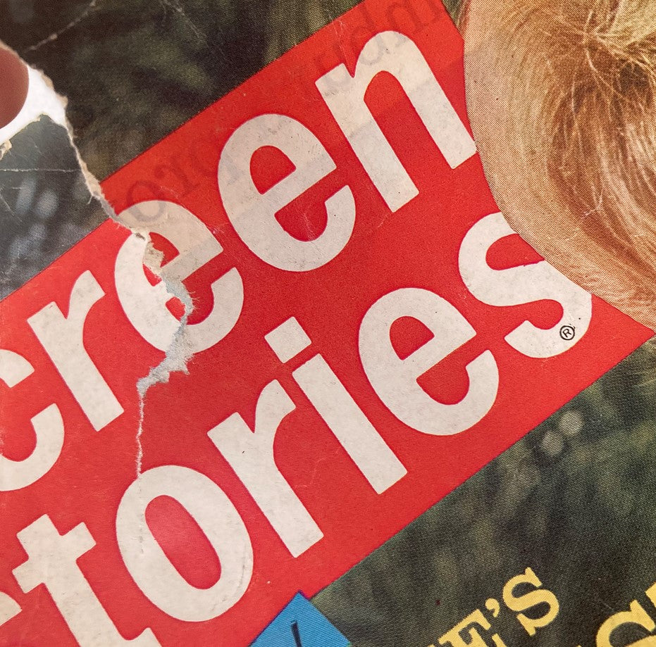 Close-up detail of the cover of VTG Screen Stories Magazine July 1964, showing a tear in the title section along with the magazine's nostalgic charm.