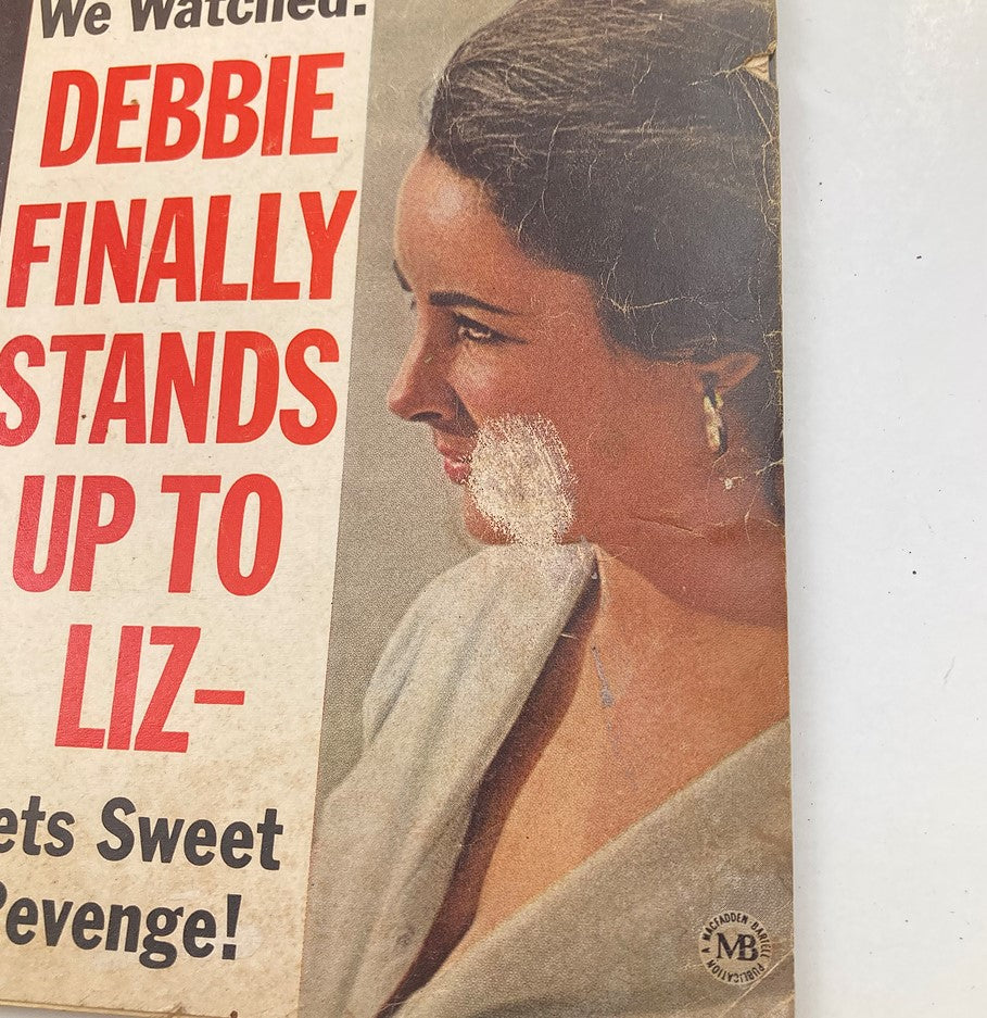 Close-up view of the front cover of VTG Motion Picture Magazine January 1965 Vol 54 #648 showing Debbie Reynolds alongside Elizabeth Taylor with bold red text.