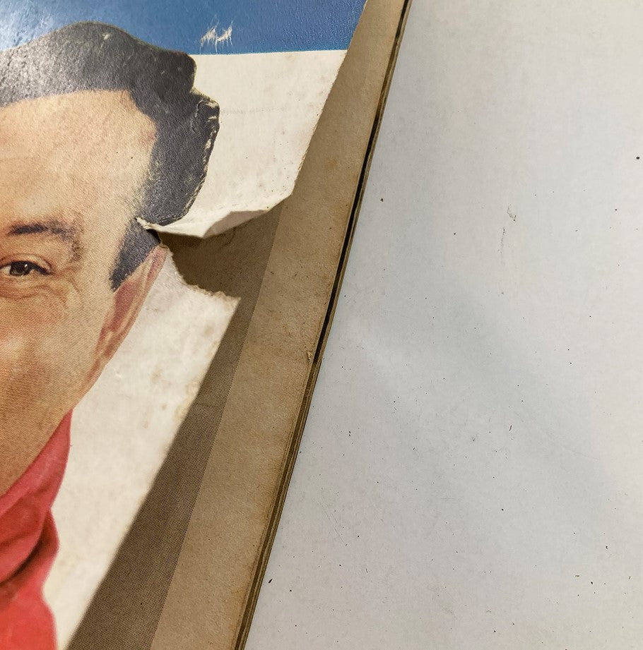 Close-up view of the damaged corner of the VTG TV Radio Mirror Magazine June 1955, featuring images of Audrey Meadows and Jackie Gleason on the cover.