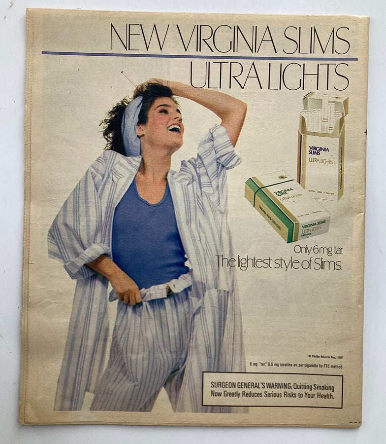 National Enquirer Tabloid October 13 1987 featuring a retro advertisement for Virginia Slims Ultra Lights with a woman posing in stylish loungewear, promoting the lightest style of cigarettes.