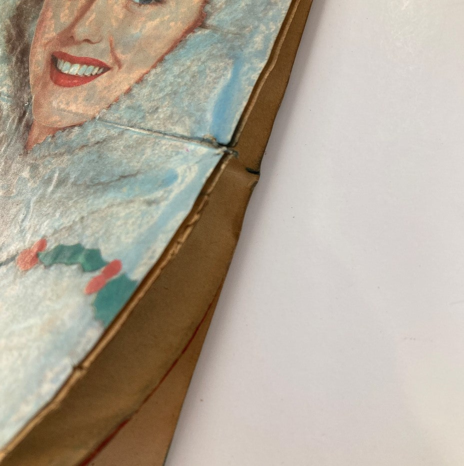 Close-up of VTG Secrets Magazine December 1959 cover showing a woman's face and holiday-themed decoration.