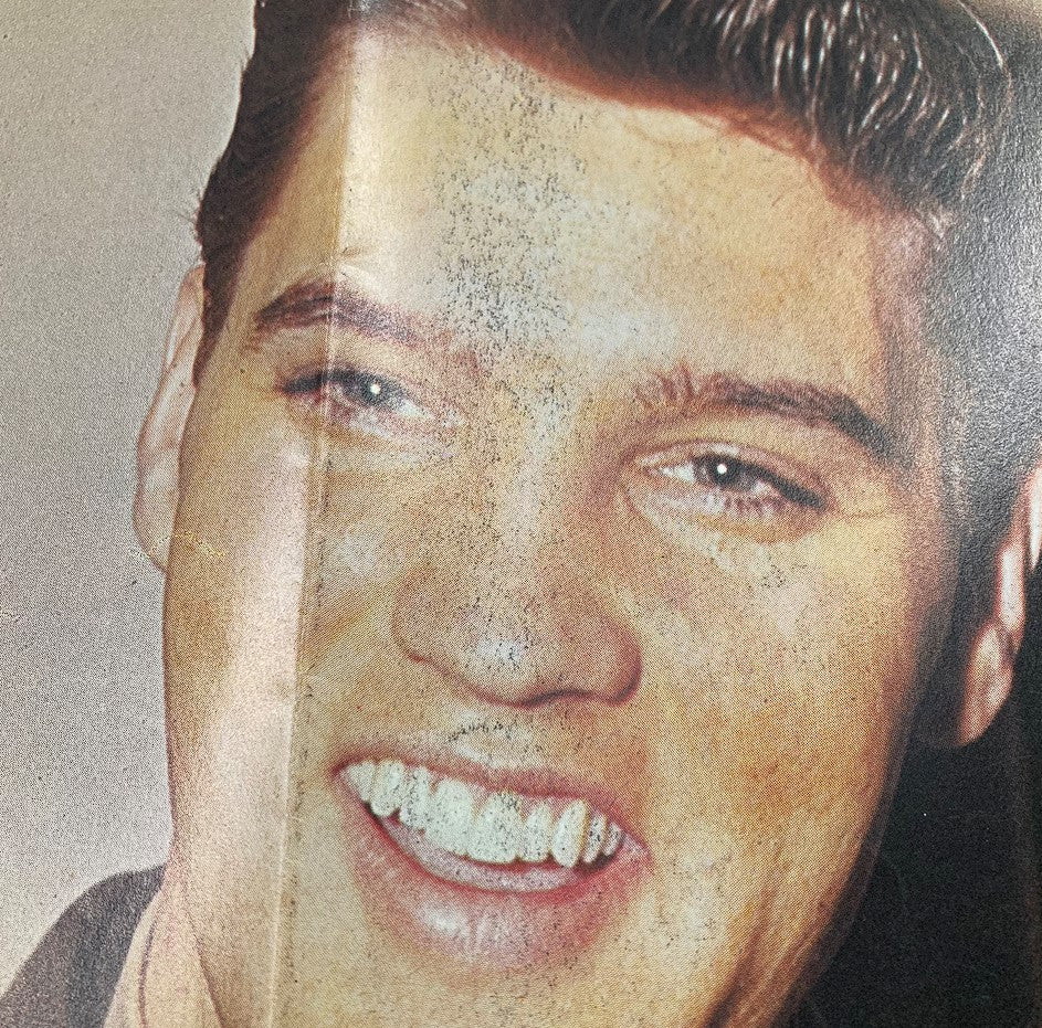 Close-up of Elvis Presley in the 1979 Elvis Presley Lives Memorial Edition Magazine, highlighting his bright smile and distinctive features.